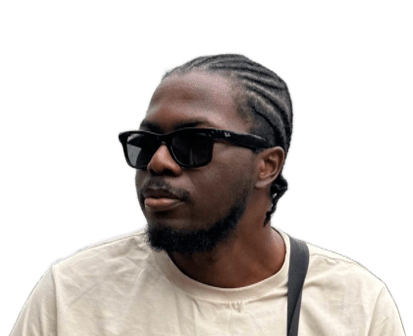 Portrait of Daniel Abudu in sunglasses and a cream t-shirt, looking off to one side.